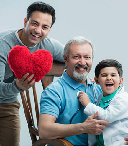 Senior couple standing outdoors with a bicycle in a green park