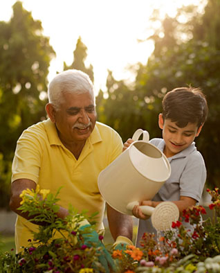 Female doctor helping an elderly woman with a crutch during a walk
